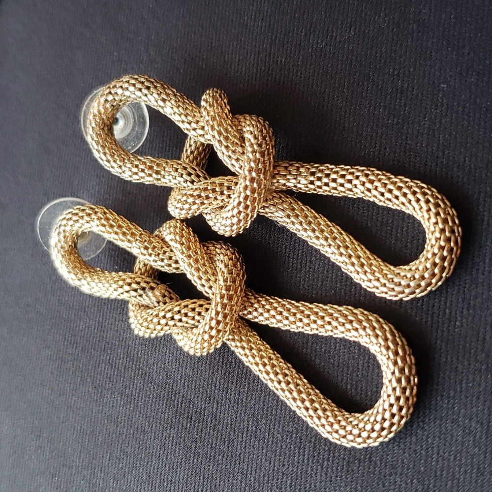 Gold snakeskin pattern knot chain earrings